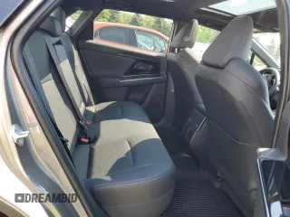 2023 Toyota bZ4X XLE z VIN JTMABACA1PA036308, wystawiony jako Copart lot #55640284 z przebiegiem Nie podano mil oraz . Historia ofert i sprzedaży dostępna na DreamBid. Obrazek 11.