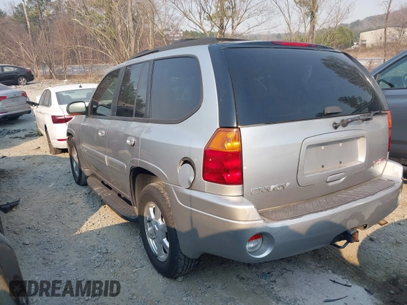 2005 GMC Envoy SLT with VIN 1GKDT13S752251920, listed as a IAAI auction lot 41670725 with 192,509 mi miles. Bid and sale history available at carsss.com. Image 3.