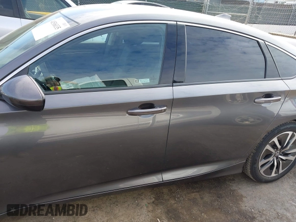 2020 Honda Accord with VIN 1HGCV3F11LA009242, listed as a IAAI auction lot 41516135 with 62,725 mi miles and . Bid and sale history available at DreamBid. Image 14.