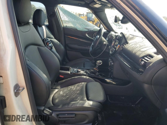 2017 MINI Clubman Cooper S with VIN WMWLN9C31H2E49891, listed as a Copart auction lot 74787744 with 100,347 mi miles and Salvage Title. Bid and sale history available at carsss.com. Image 7.