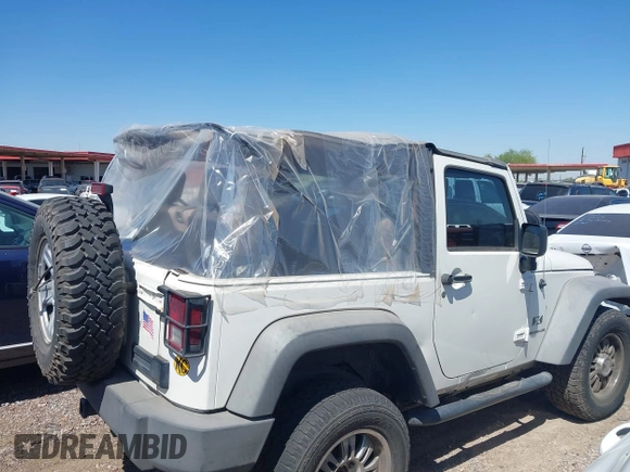 2007 Jeep Wrangler X with VIN 1J4FA24137L128418, listed as a IAAI auction lot 42317921 with 148,412 mi miles and . Bid and sale history available at DreamBid. Image 13.