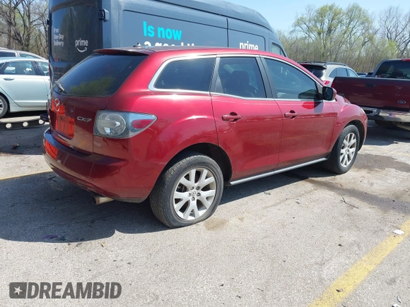 2009 Mazda CX-7 Sport with VIN JM3ER293590222266, listed as a IAAI auction lot 41930586 with 173,242 mi miles. Bid and sale history available at carsss.com. Image 4.