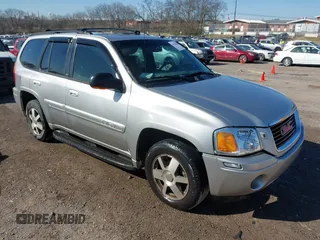 2004 GMC Envoy SLE with VIN 1GKDT13S042337388, listed as a IAAI auction lot 41756816 with 309,789 mi miles. Bid and sale history available at carsss.com. Image 1.