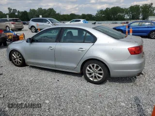 2012 Volkswagen Jetta SE with VIN 3VWDP7AJ5CM301844, listed as a Copart auction lot 60648525 with 204,031 mi miles and Clean title. Bid and sale history available at DreamBid. Image 2.