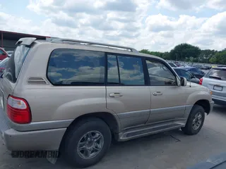 2001 Lexus LX 470 with VIN JTJHT00W713511796, listed as a IAAI auction lot 42222574 with 297,427 mi miles and . Bid and sale history available at carsss.com. Image 13.