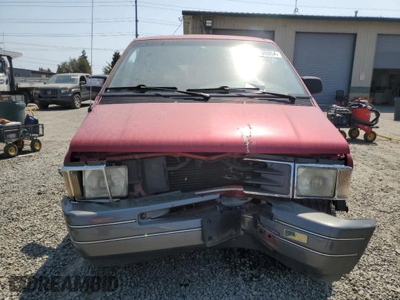 1993 Ford Aerostar z VIN 1FMCA11U0PZB97965, wystawiony jako Copart lot #65148054 z przebiegiem 86 569 mil mil oraz Szkody całkowita. Historia ofert i sprzedaży dostępna na DreamBid. Obrazek 5.