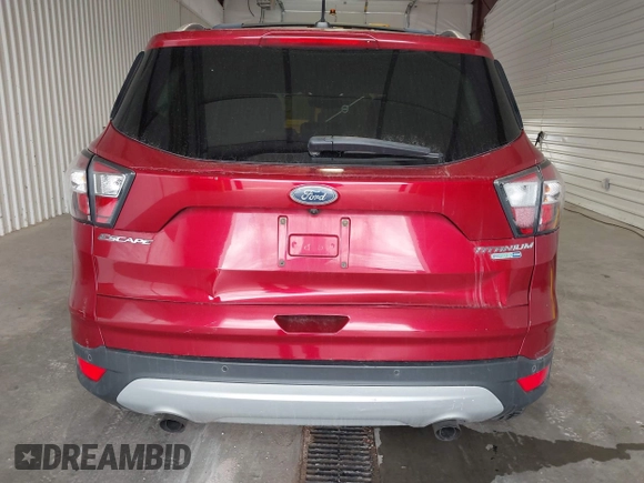 2017 Ford Escape Titanium with VIN 1FMCU9J91HUA32264, listed as a IAAI auction lot 42050273 with 201,128 mi miles. Bid and sale history available at carsss.com. Image 16.