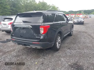 2022 Ford Explorer XLT with VIN 1FMSK8DH9NGA52903, listed as a IAAI auction lot 42704656 with 63,591 mi miles and . Bid and sale history available at DreamBid. Image 4.