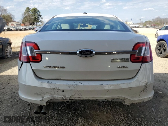 2011 Ford Taurus SEL with VIN 1FAHP2EW9BG128793, listed as a Copart auction lot 48940475 with 121,681 mi miles and Salvage Title. Bid and sale history available at DreamBid. Image 6.