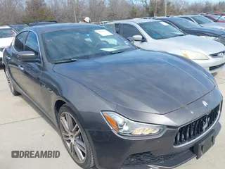 2016 Maserati Ghibli S with VIN ZAM57RSA7G1168830, listed as a IAAI auction lot 41693197 with 105,462 mi miles. Bid and sale history available at carsss.com. Image 1.