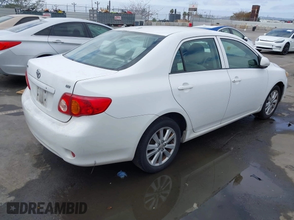 2009 Toyota Corolla with VIN 1NXBU40E99Z082845, listed as a IAAI auction lot 42046564 with 180,910 mi miles. Bid and sale history available at carsss.com. Image 4.