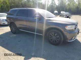 2014 Dodge Durango Limited with VIN 1C4RDJDG4EC314765, listed as a Copart auction lot 54779755 with 120,997 mi miles and Salvage title. Bid and sale history available at DreamBid. Image 4.