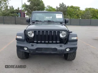 2018 Jeep Wrangler Unlimited Sport S with VIN 1C4HJXDG8JW105612, listed as a IAAI auction lot 42420765 with 54,873 mi miles and . Bid and sale history available at DreamBid. Image 11.