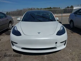2023 Tesla Model 3 Long Range with VIN 5YJ3E1EB1PF393565, listed as a IAAI auction lot 41656060 with 16,236 mi miles and . Bid and sale history available at DreamBid. Image 12.