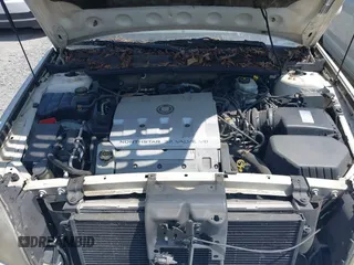 2001 Cadillac DeVille z VIN 1G6KD54Y91U197323, wystawiony jako IAAI lot #42251408 z przebiegiem Nie podano mil oraz . Historia ofert i sprzedaży dostępna na DreamBid. Obrazek 10.