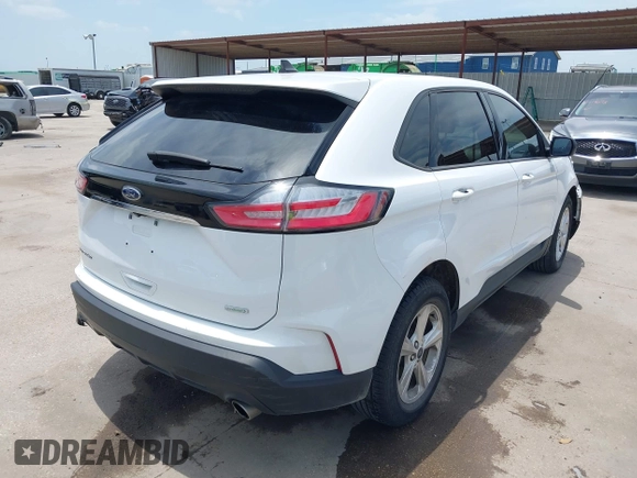 2020 Ford Edge SE z VIN 2FMPK3G90LBB05473, wystawiony jako IAAI lot #42447819 z przebiegiem 69 612 mil mil oraz . Historia ofert i sprzedaży dostępna na DreamBid. Obrazek 4.