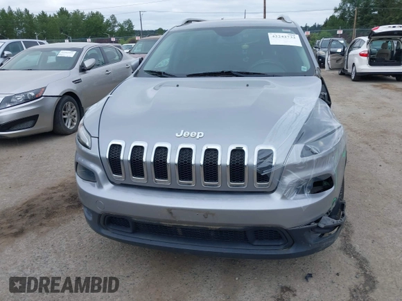 2014 Jeep Cherokee Latitude with VIN 1C4PJLCS1EW105984, listed as a IAAI auction lot 42242732 with 89,325 mi miles and . Bid and sale history available at DreamBid. Image 17.