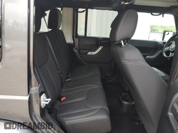 2016 Jeep Wrangler Unlimited Sahara с VIN 1C4BJWEG5GL221827, выставлен на аукционе Copart как лот 60411625 с пробегом 65 405 миль миль и Списание • Salvage title. История ставок и продаж доступна на DreamBid. Изображение 10.