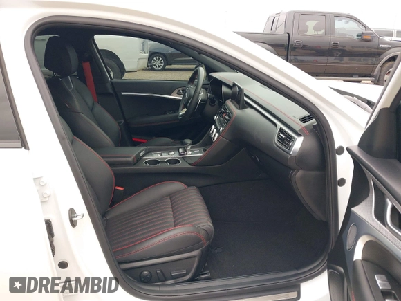 2023 Genesis G70 2.0T z VIN KMTG34TA1PU130245, wystawiony jako IAAI lot #41198085 z przebiegiem 21 483 mil mil oraz . Historia ofert i sprzedaży dostępna na DreamBid. Obrazek 5.