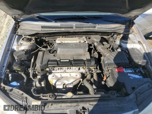 2007 Kia Spectra EX with VIN KNAFE121475450624, listed as a Copart auction lot 77712594 with 100,646 mi miles and Salvage Title. Bid and sale history available at carsss.com. Image 11.