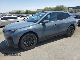 2023 BMW iX M60 with VIN WB533CF00PCL89501, listed as a Copart auction lot 66592354 with 7,729 mi miles and Salvage Title. Bid and sale history available at carsss.com. Image 1.