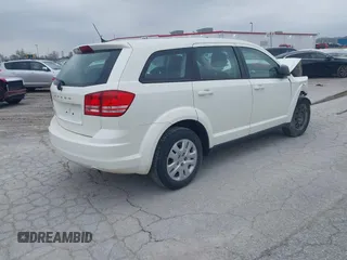 2014 Dodge Journey SE with VIN 3C4PDCAB7ET134454, listed as a IAAI auction lot 41966206 with 145,814 mi miles and . Bid and sale history available at DreamBid. Image 4.