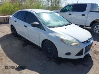 2013 Ford Focus S with VIN 1FADP3E27DL200618, listed as a IAAI auction lot 42028086 with 131,438 mi miles. Bid and sale history available at carsss.com. Image 1.