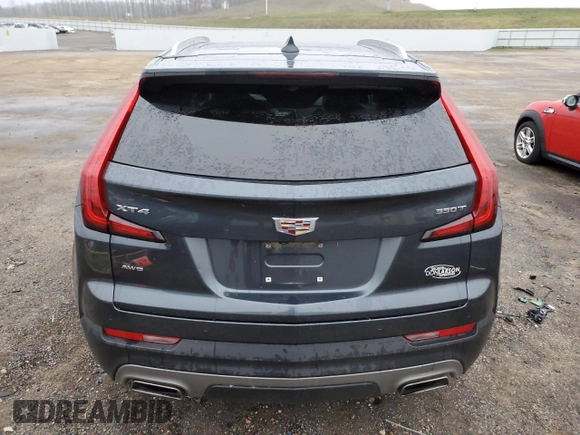 2021 Cadillac XT4 AWD Premium Luxury with VIN 1GYFZDR43MF057481, listed as a Copart auction lot 80966804 with 52,339 mi miles and Salvage Title. Bid and sale history available at carsss.com. Image 6.