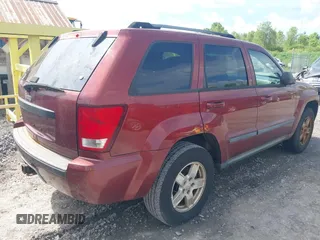 2007 Jeep Grand Cherokee Laredo z VIN 1J8HR48N87C609080, wystawiony jako IAAI lot #42391793 z przebiegiem 159 096 mil mil oraz . Historia ofert i sprzedaży dostępna na DreamBid. Obrazek 4.
