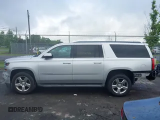 2015 Chevrolet Suburban LT z VIN 1GNSCJKC2FR144528, wystawiony jako IAAI lot #42320028 z przebiegiem 226 076 mil mil oraz . Historia ofert i sprzedaży dostępna na DreamBid. Obrazek 14.