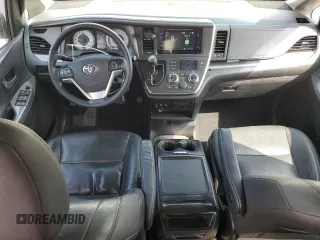2015 Toyota Sienna SE with VIN 5TDXK3DC7FS601720, listed as a Copart auction lot 59959325 with 262,419 mi miles and Salvage title. Bid and sale history available at DreamBid. Image 8.