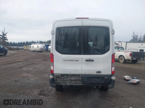 2016 Ford Transit Cargo with VIN 1FTYR2CM1GKB06300, listed as a IAAI auction lot 41636486 with 159,916 mi miles and . Bid and sale history available at DreamBid. Image 17.