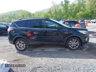 2017 Ford Escape SE with VIN 1FMCU9G91HUB56073, listed as a IAAI auction lot 42130463 with 94,275 mi miles and . Bid and sale history available at carsss.com. Image 13.