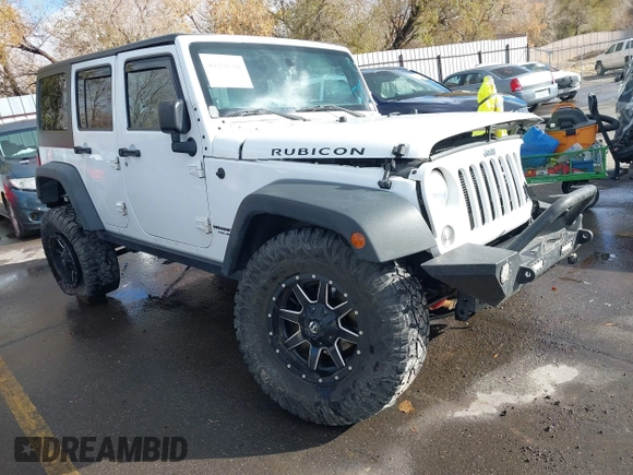2014 Jeep Wrangler Unlimited Rubicon with VIN 1C4BJWFG2EL264792, listed as a IAAI auction lot 40938380 with 145,886 mi miles. Bid and sale history available at carsss.com. Image 1.