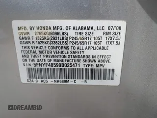 2009 Honda Pilot EX-L with VIN 5FNYF48599B025471, listed as a IAAI auction lot 42133938 with 217,105 mi miles. Bid and sale history available at carsss.com. Image 9.