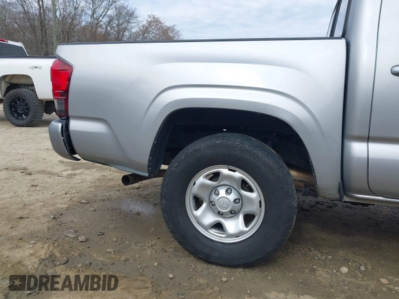 2018 Toyota Tacoma SR with VIN 3TMCZ5AN4JM130307, listed as a IAAI auction lot 41541477 with 74,369 mi miles and . Bid and sale history available at DreamBid. Image 19.