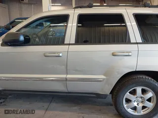 2010 Jeep Grand Cherokee Laredo with VIN 1J4RR4GT9AC106381, listed as a IAAI auction lot 41723268 with 180,008 mi miles. Bid and sale history available at carsss.com. Image 6.