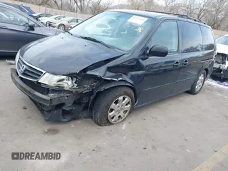 2004 Honda Odyssey EX-L with VIN 5FNRL18914B037976, listed as a IAAI auction lot 41893438 with Not Provided miles and . Bid and sale history available at DreamBid. Image 17.