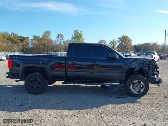 2017 Chevrolet Silverado 1500 LT with VIN 1GCVKREC0HZ293560, listed as a IAAI auction lot 40706331 with 133,438 mi miles. Bid and sale history available at carsss.com. Image 13.