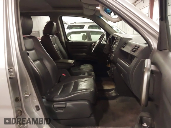 2009 Honda Ridgeline RTL with VIN 2HJYK16519H000129, listed as a IAAI auction lot 41891810 with 186,124 mi miles. Bid and sale history available at carsss.com. Image 5.