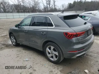 2021 Audi Q3 Premium with VIN WA1AUCF33M1100504, listed as a Copart auction lot 51975165 with 74,054 mi miles and Salvage Title. Bid and sale history available at carsss.com. Image 2.