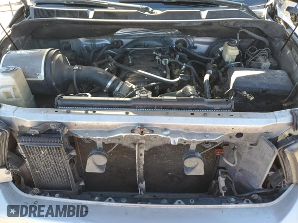 2010 Toyota Tundra Limited с VIN 5TFHW5F19AX101707, выставлен на аукционе Copart как лот 81170424 с пробегом Не указан миль и Списание • Salvage title. История ставок и продаж доступна на DreamBid. Изображение 11.