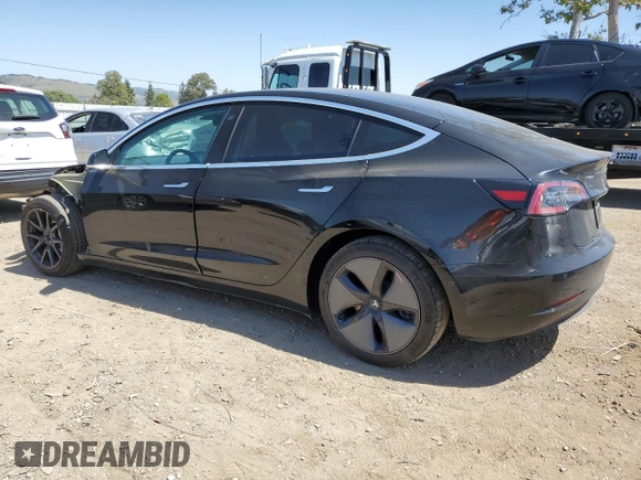 2018 Tesla Model 3 Long Range Battery z VIN 5YJ3E1EBXJF073250, wystawiony jako Copart lot #55832885 z przebiegiem 50 196 mil mil oraz Szkoda całkowita • Salvage title. Historia ofert i sprzedaży dostępna na DreamBid. Obrazek 2.