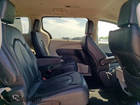 2020 Chrysler Pacifica Touring L with VIN 2C4RC1BG7LR125649, listed as a Copart auction lot 57873365 with 117,114 mi miles and Salvage title. Bid and sale history available at DreamBid. Image 11.