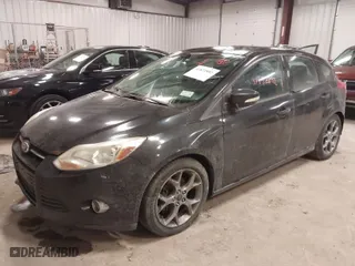 2014 Ford Focus SE with VIN 1FADP3K26EL337345, listed as a IAAI auction lot 41872892 with 169,472 mi miles. Bid and sale history available at carsss.com. Image 2.
