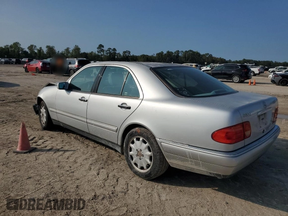 1999 Mercedes-Benz E-Class with VIN WDBJF65H9XA903481, listed as a Copart auction lot 79516914 with 201,080 mi miles and Salvage Title. Bid and sale history available at carsss.com. Image 2.