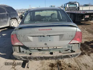2003 Ford Focus ZTS with VIN 1FAFP38393W115936, listed as a Copart auction lot 42598715 with 100,610 mi miles and Salvage Title. Bid and sale history available at carsss.com. Image 6.