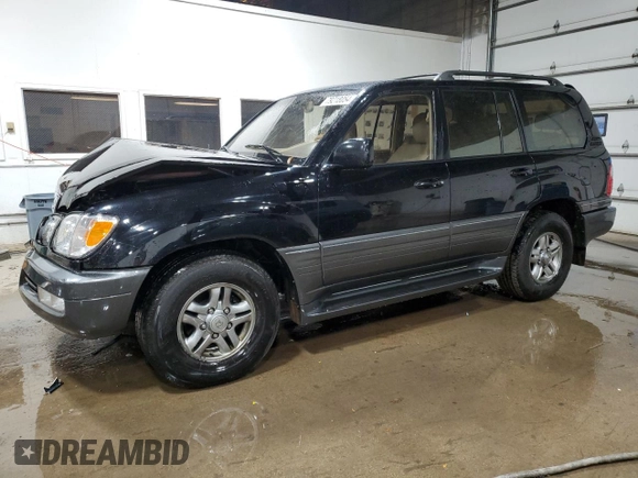 2002 Lexus LX 470 z VIN JTJHT00W023515545, wystawiony jako Copart lot #79218054 z przebiegiem 310 334 mil mil oraz Szkoda całkowita • Salvage title. Historia ofert i sprzedaży dostępna na DreamBid. Obrazek 1.