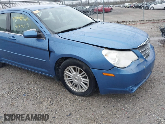 2007 Chrysler Sebring Touring z VIN 1C3LC56K47N533285, wystawiony jako IAAI lot #41869938 z przebiegiem 189 721 mil mil oraz . Historia ofert i sprzedaży dostępna na DreamBid. Obrazek 13.