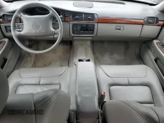 1999 Cadillac DeVille z VIN 1G6KD54Y2XU807846, wystawiony jako Copart lot #53070705 z przebiegiem Nie podano mil oraz Czysty tytuł • Clean title. Historia ofert i sprzedaży dostępna na DreamBid. Obrazek 8.